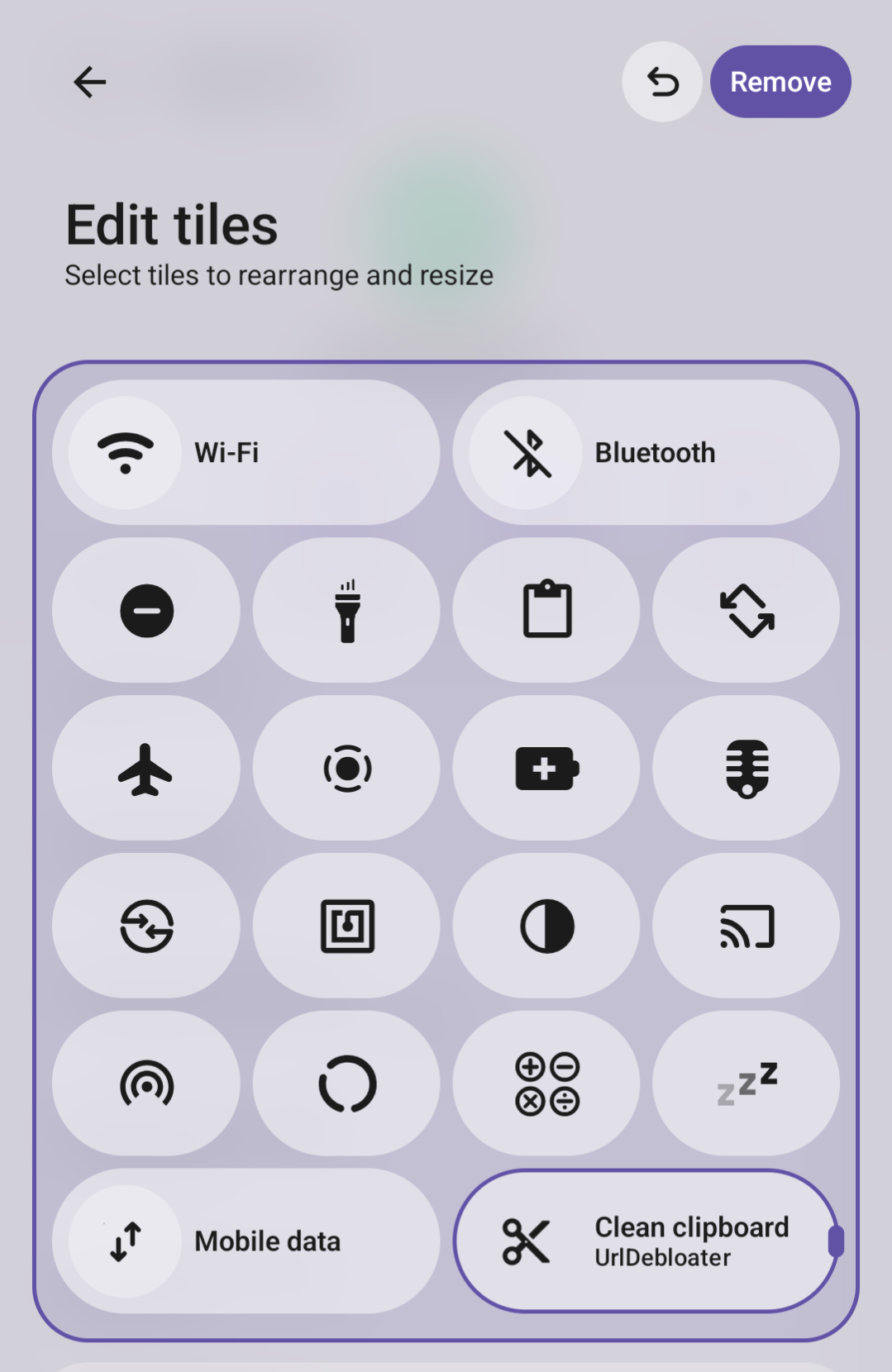 Android Quick Settings panel with the UrlDebloater clipboard cleaning tile